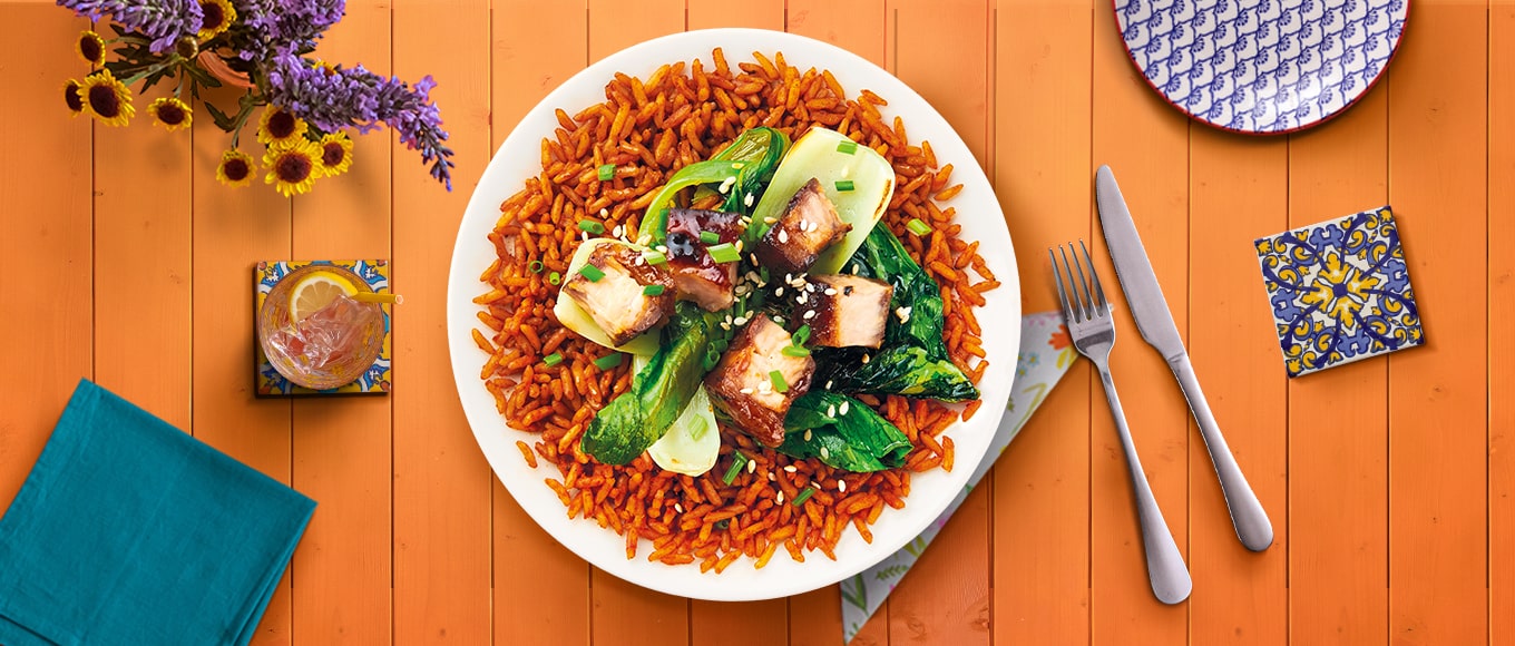 A juicy pork tenderloin paired with slaw and savory Spanish-style rice all in one-recipe.